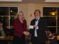 presenting the cheque to Brookfields head teacher