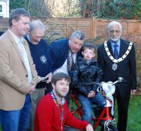 presenting Ben with his new trike